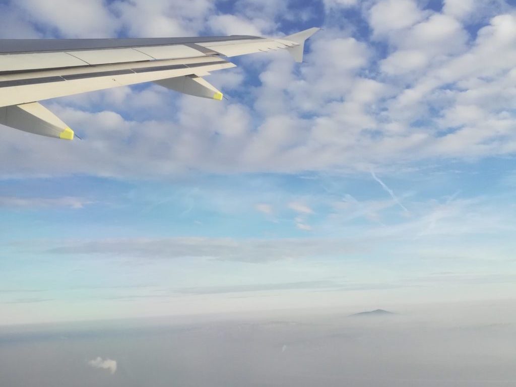 plane in the air above Belgrade in winter