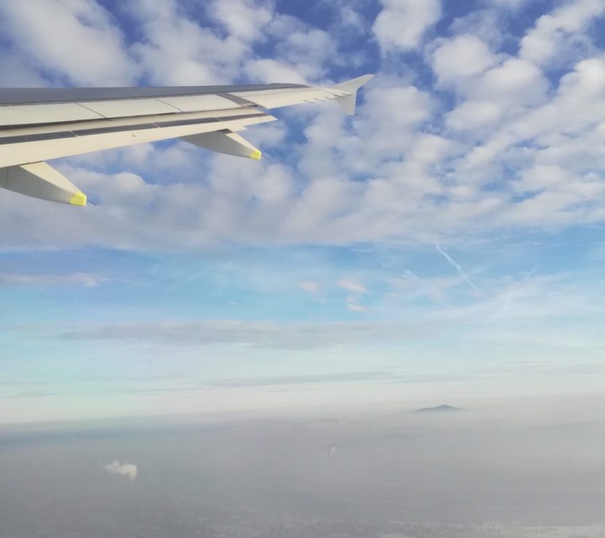 plane in the air above Belgrade in winter