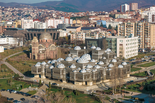 View of Pristina, the national library and the unfinished Serbian orthodox church of the university campus from Mother Theresa's cathedral