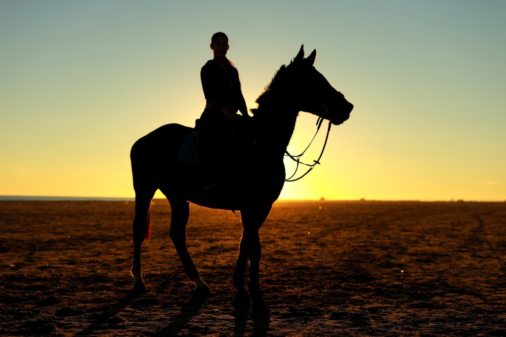 A Woman riding a horse Photo by Chema Photo on Unsplash